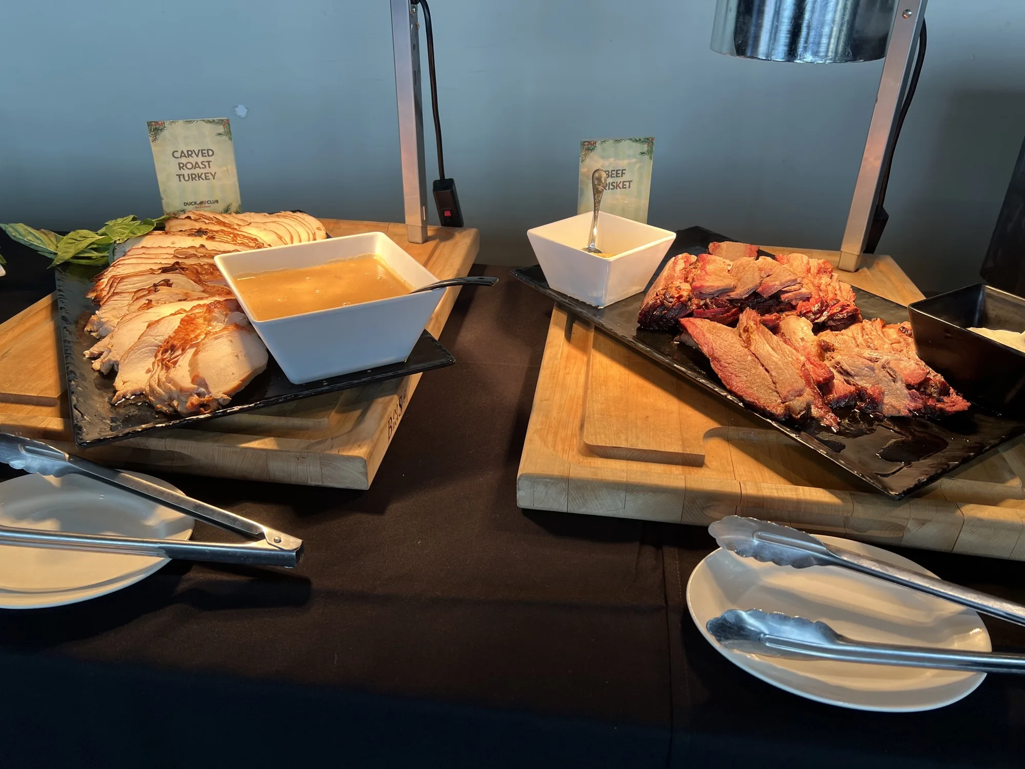 Carved turkey and beef brisket prepared for a private event buffet