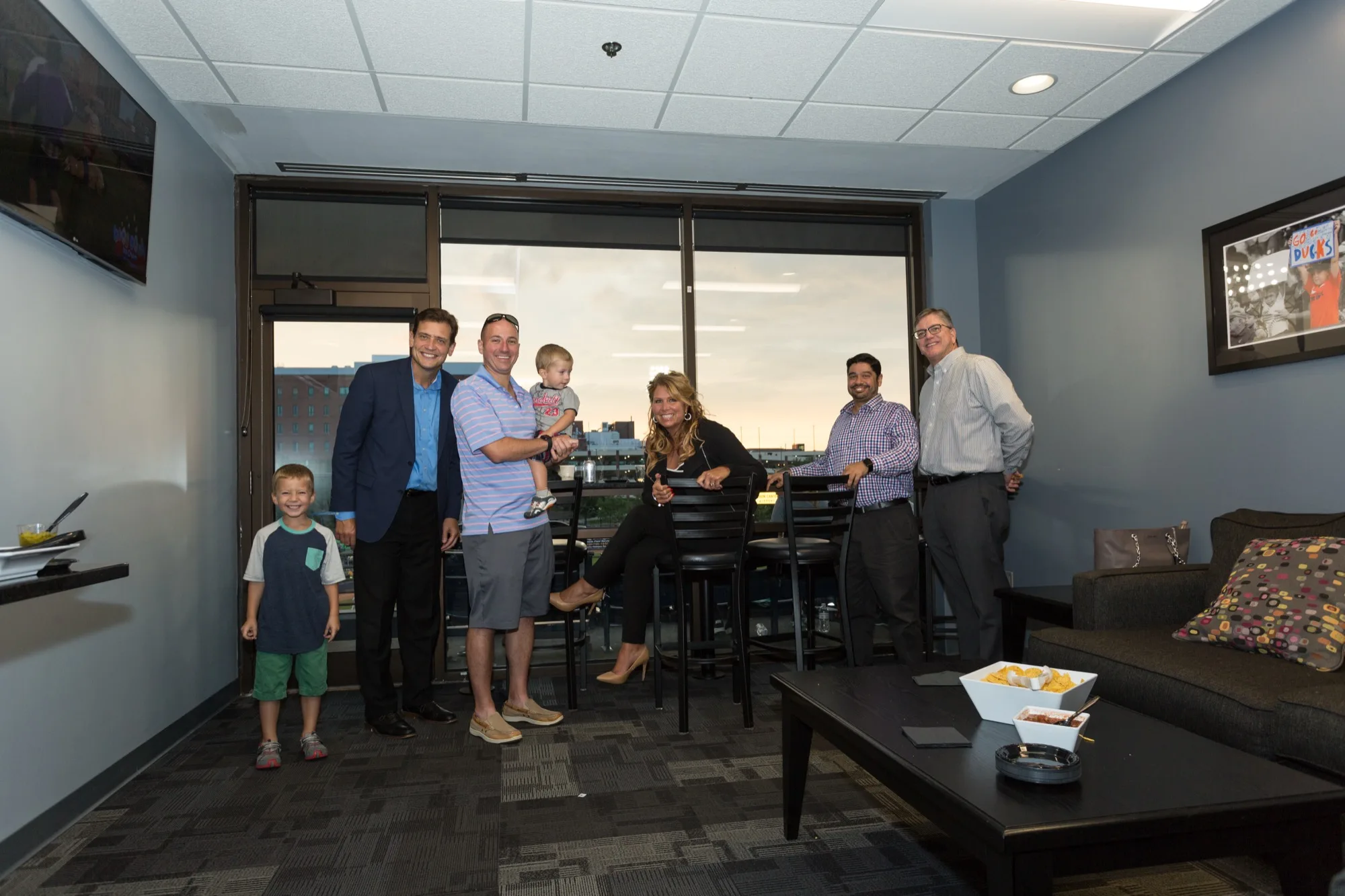 Guests gathering inside a private suite at 7 17 Credit Union Park